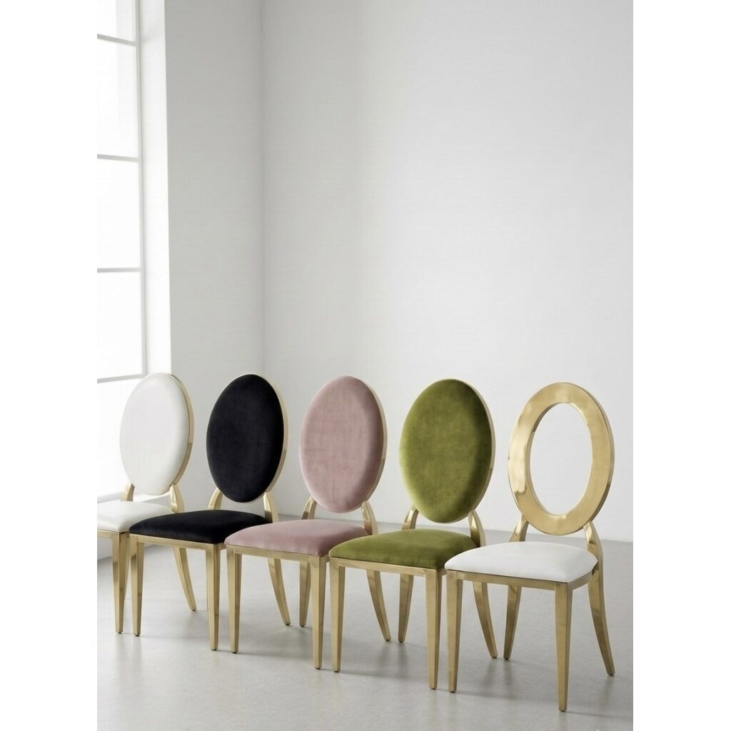Modern gold metal banquet chairs with colorful velvet cushions in white, black, pink, and green.